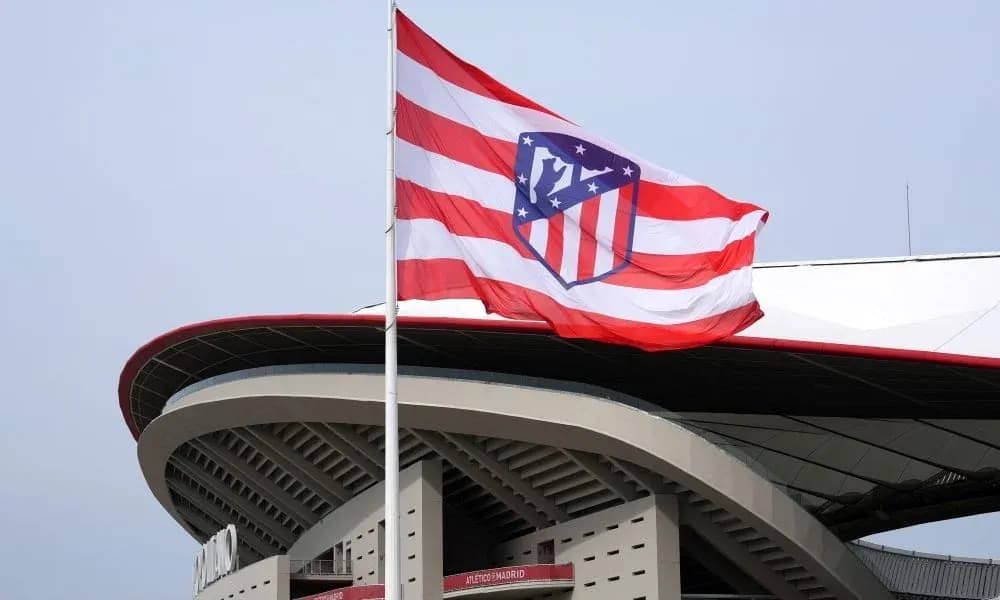 Atletico Madrid flag flying at stadium entrance