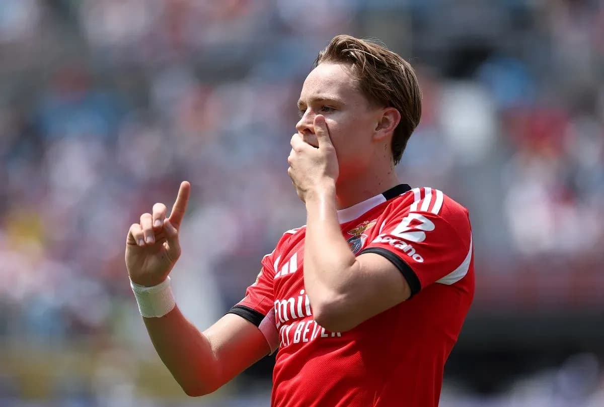 Player celebrating with finger raised during match