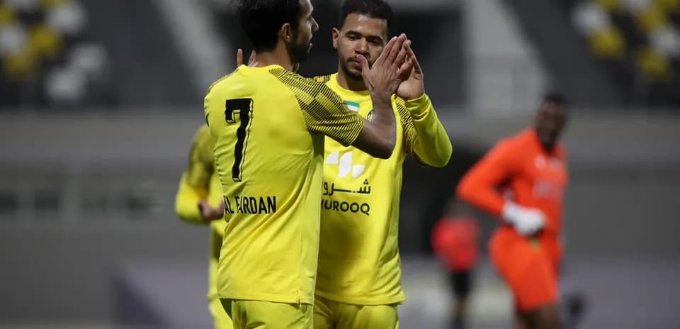 Players celebrating during Ittihad Kalba U23 match