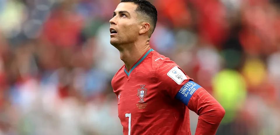 Player looking up during a match wearing Portugal jersey