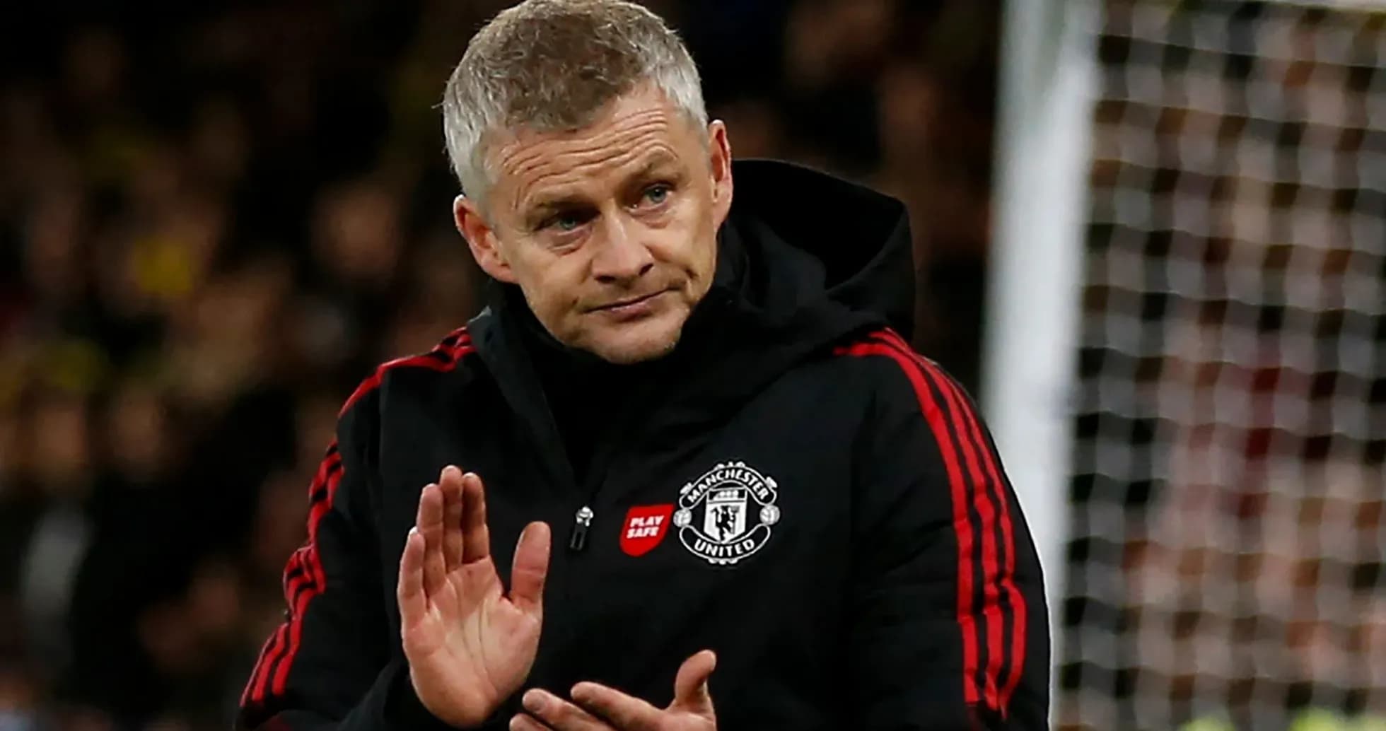 Manager gesturing during match on the sideline