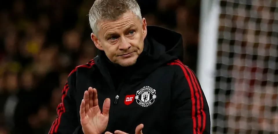 Manager gesturing during match on the sideline