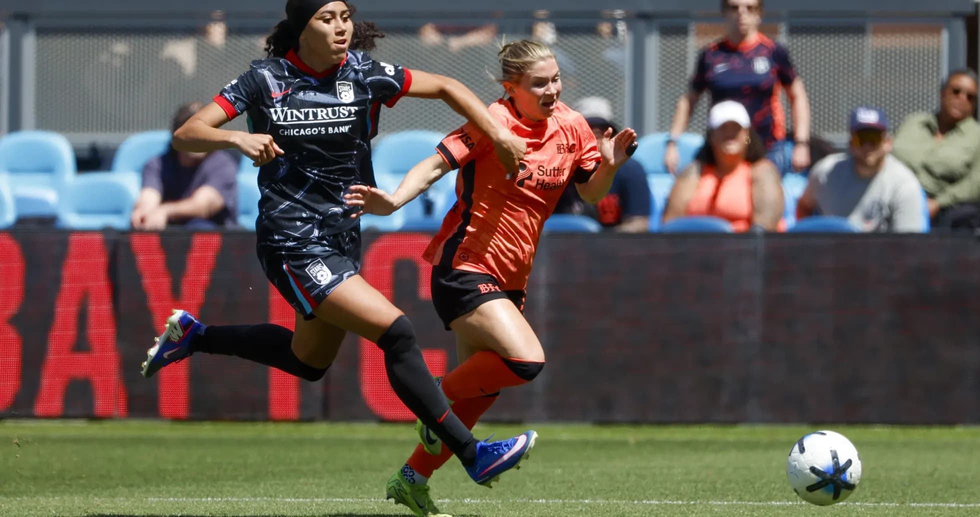 Bay FC player chasing Chicago Red Stars player