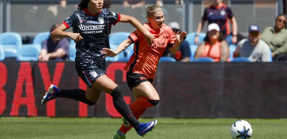Bay FC player chasing Chicago Red Stars player