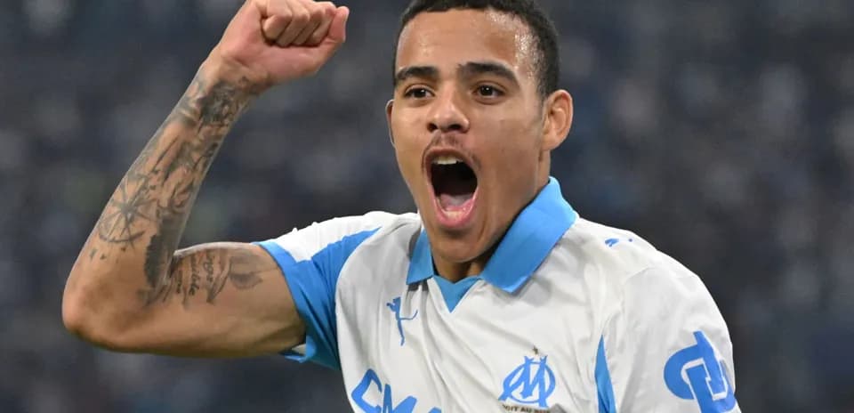 Player celebrating a goal with raised fist