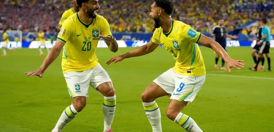 Brazil players celebrating a goal on the field