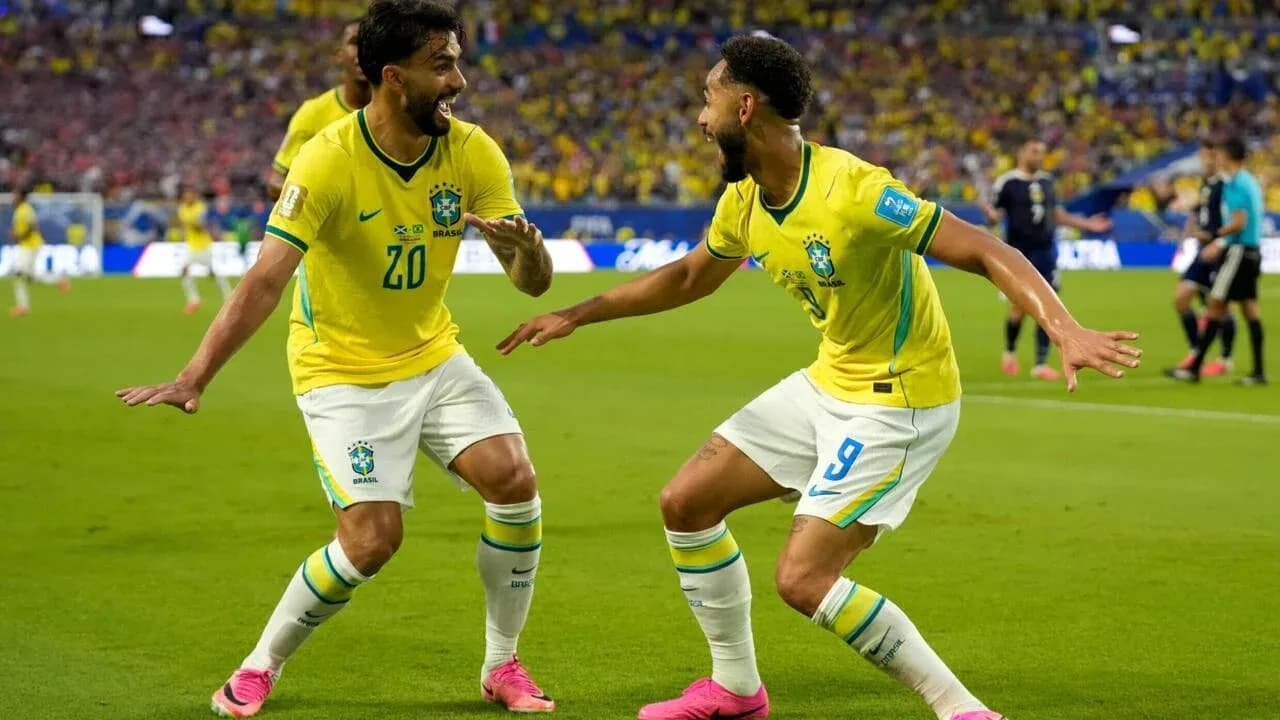 Brazil players celebrating a goal on the field