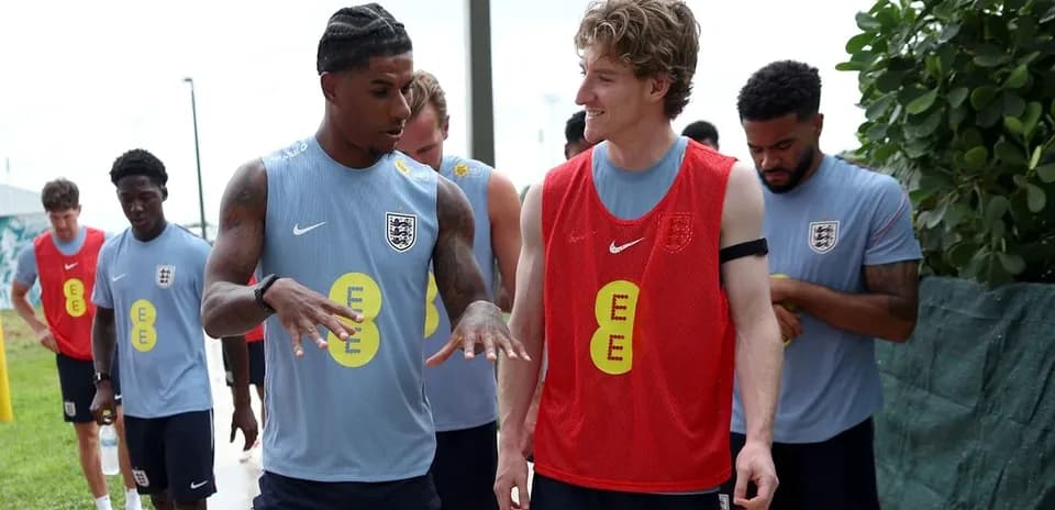 Players interacting during England training session