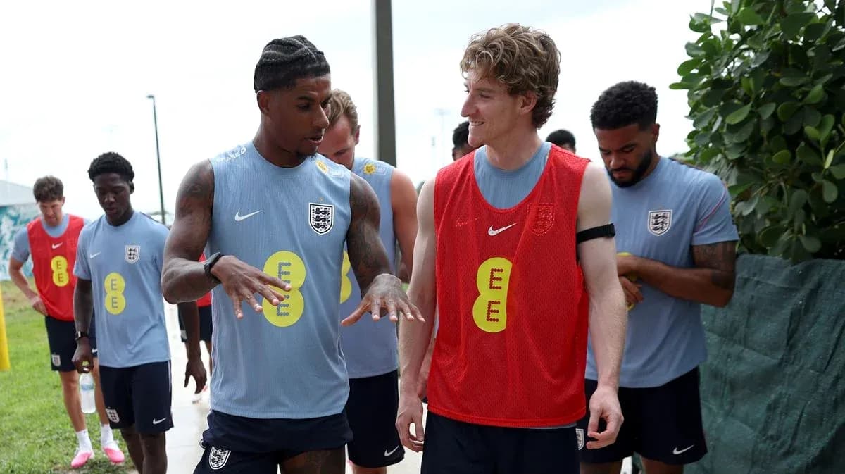 Players interacting during England training session