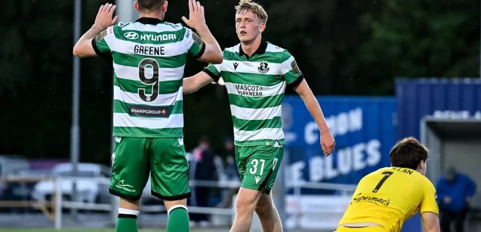 Players celebrating after a goal during match
