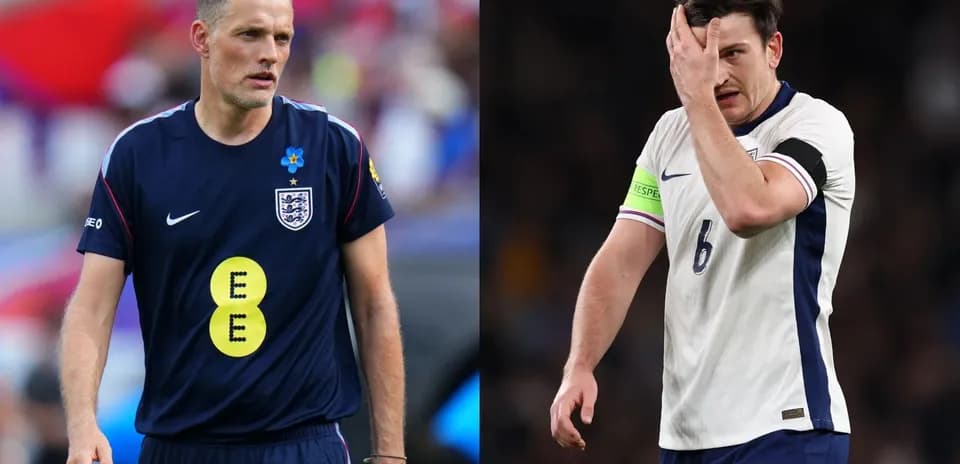 Two football players in England kits during match