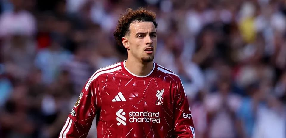 Player in Liverpool kit during match action