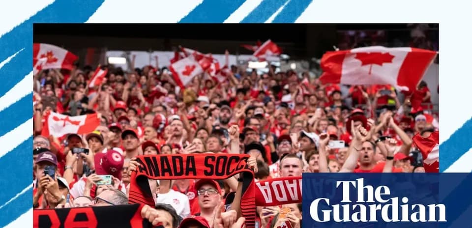 Crowd of fans cheering with Canadian flags and scarves