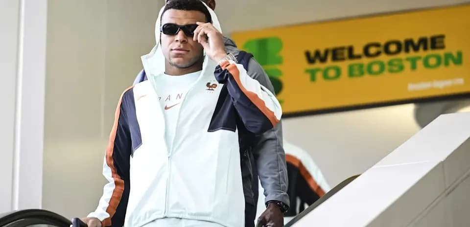 Player arriving at airport with luggage in Boston
