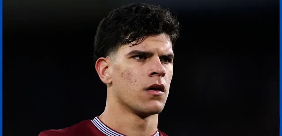 Player wearing maroon jersey during match