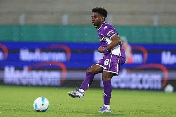 Player dribbling the ball during a match