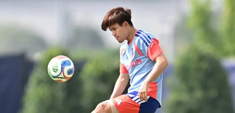Player practicing with soccer ball during training session