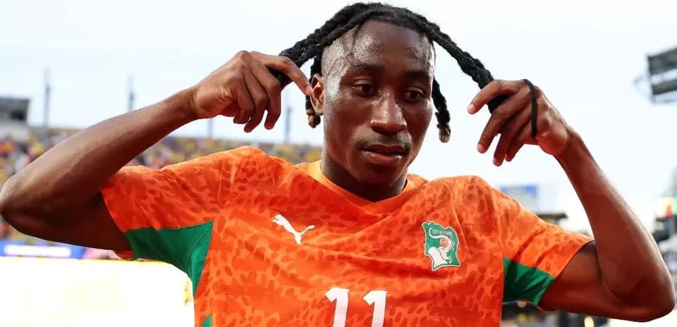 Player adjusting his hair after the match