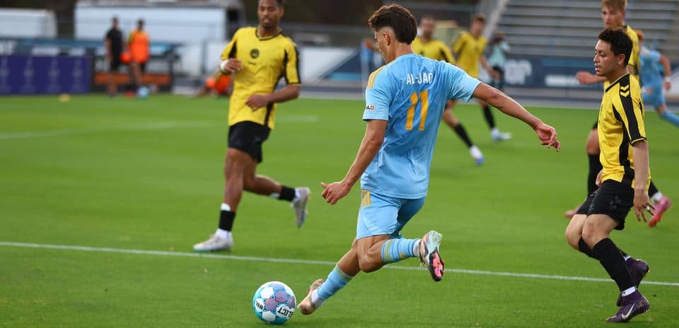 Player kicking ball during Sporting JAX match