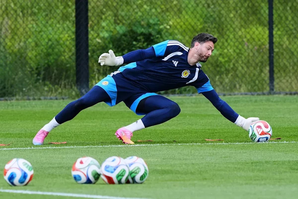 Goalkeeper diving to save a ball during training