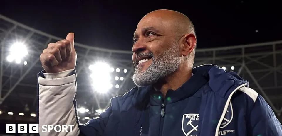 Coach celebrating in stadium after match victory