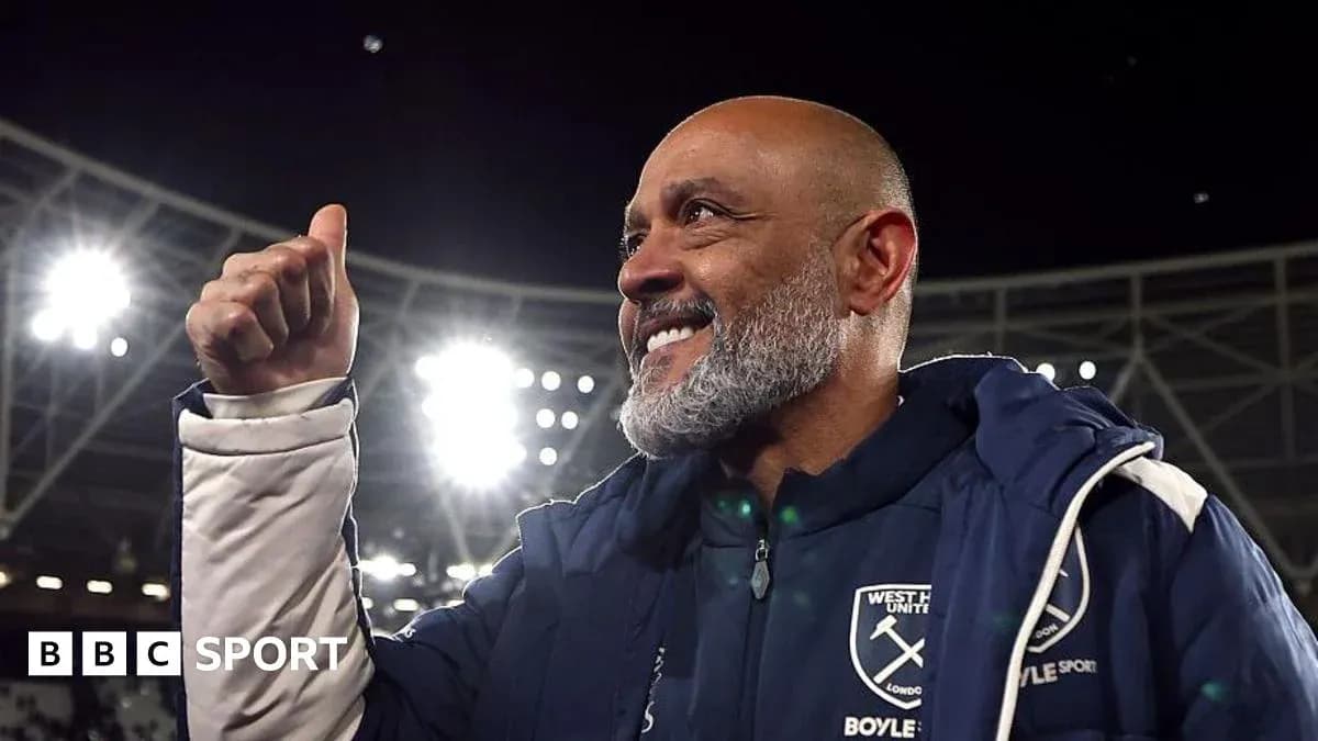 Coach celebrating in stadium after match victory