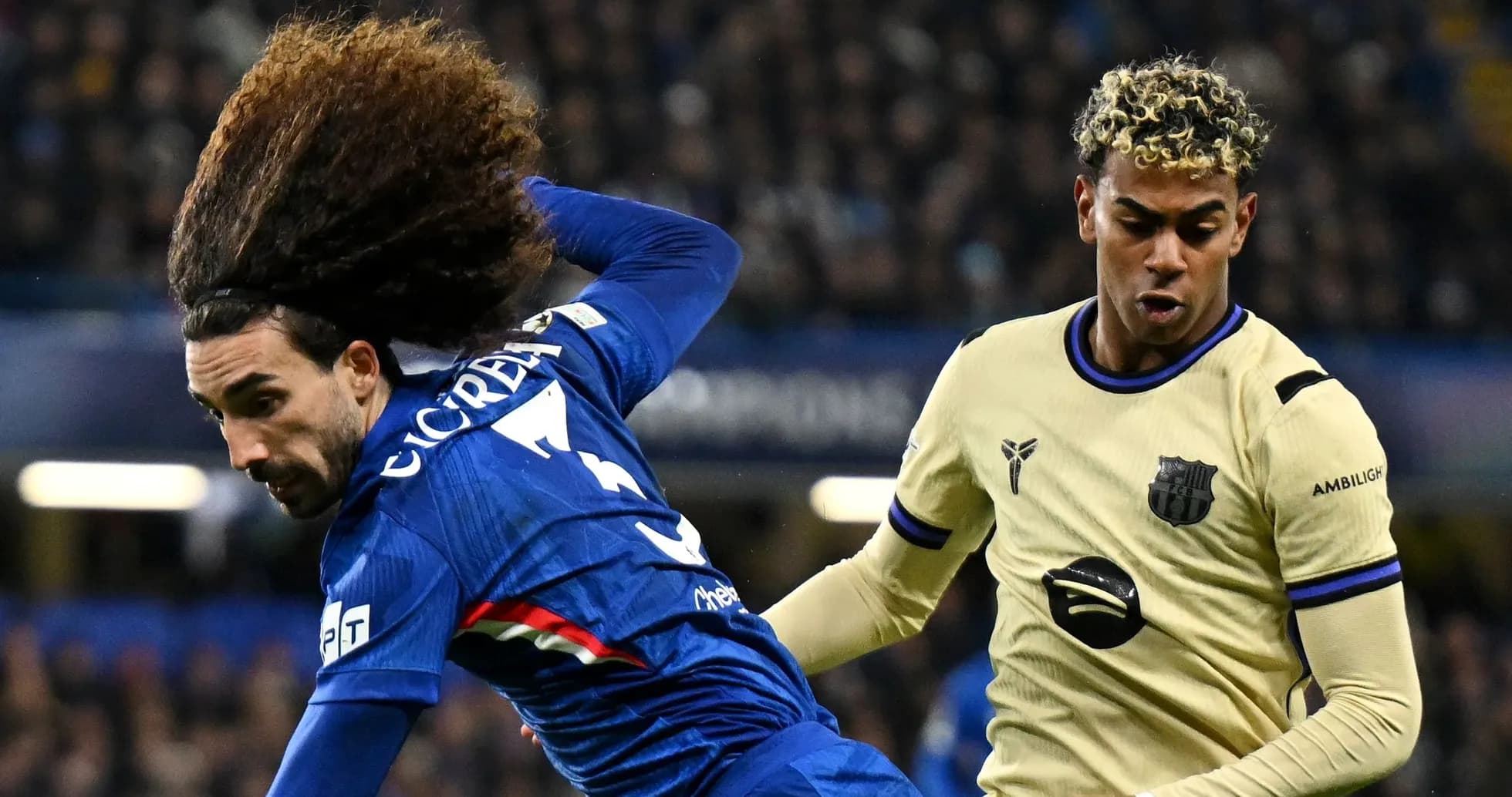 Two players contesting the ball during a match