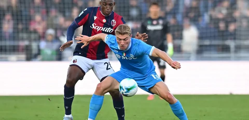Player challenging for the ball during Napoli match