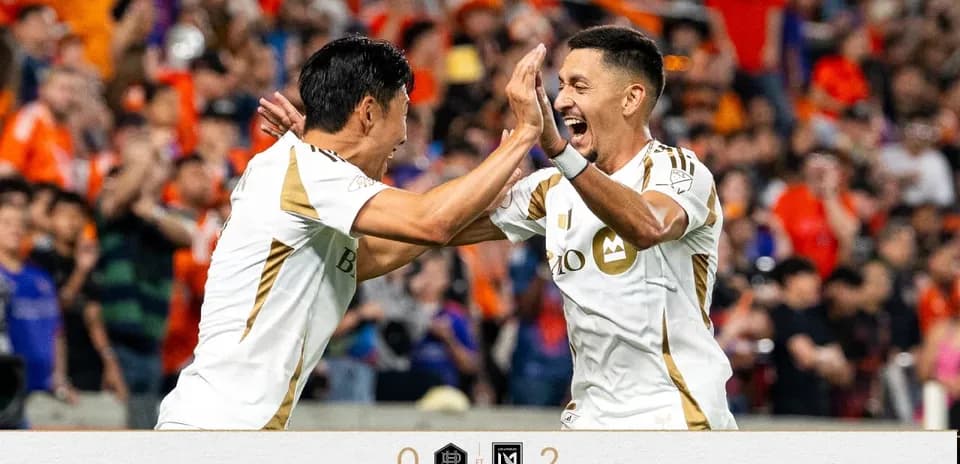 Players celebrating after scoring a goal