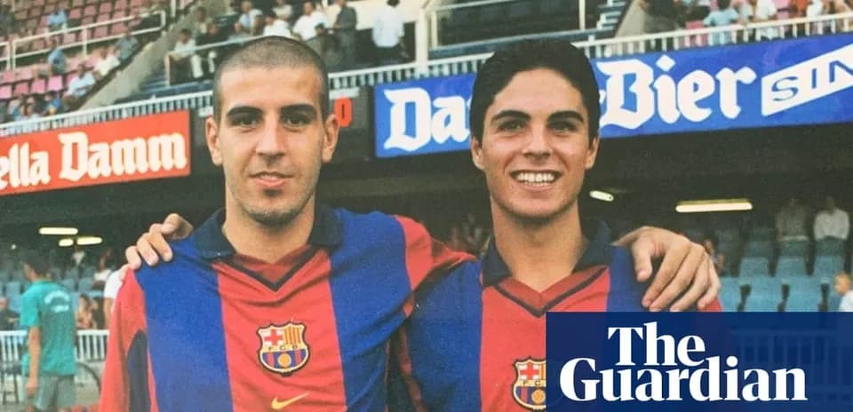 Two young players in FC Barcelona jerseys posing together