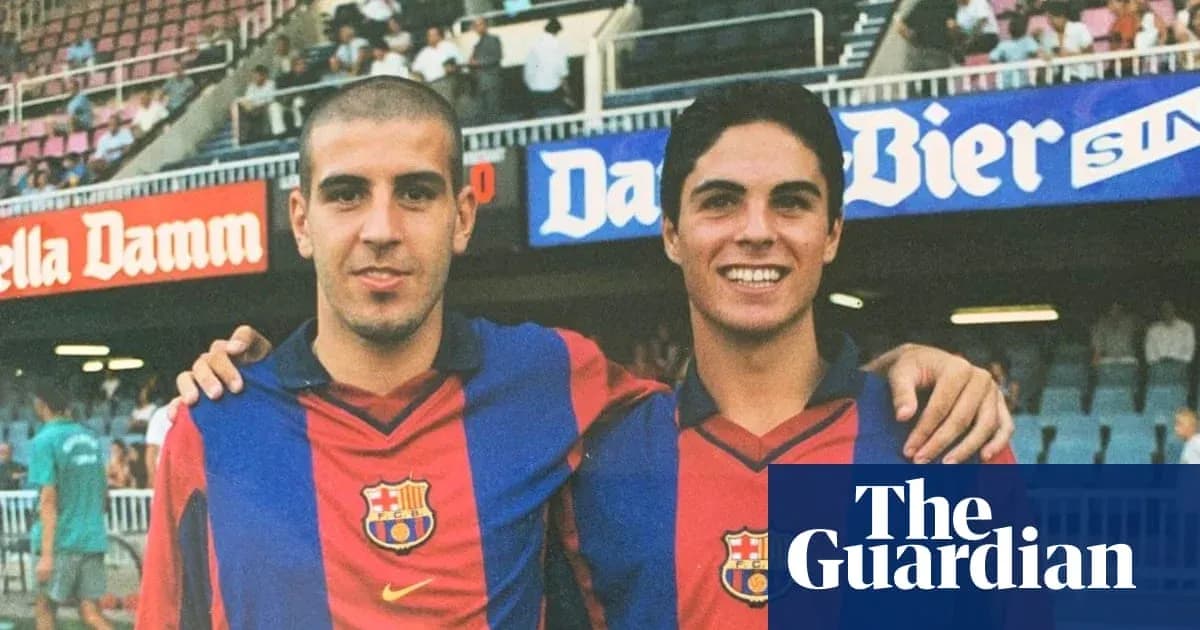 Two young players in FC Barcelona jerseys posing together