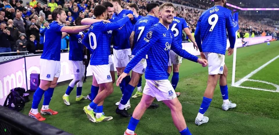 Everton players celebrating a goal during match