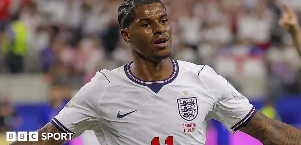 Player celebrating in England jersey during match