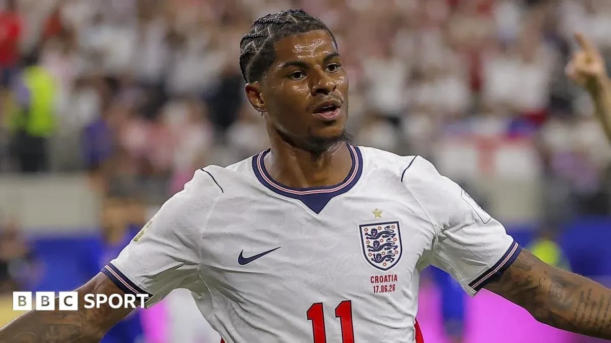 Player celebrating in England jersey during match