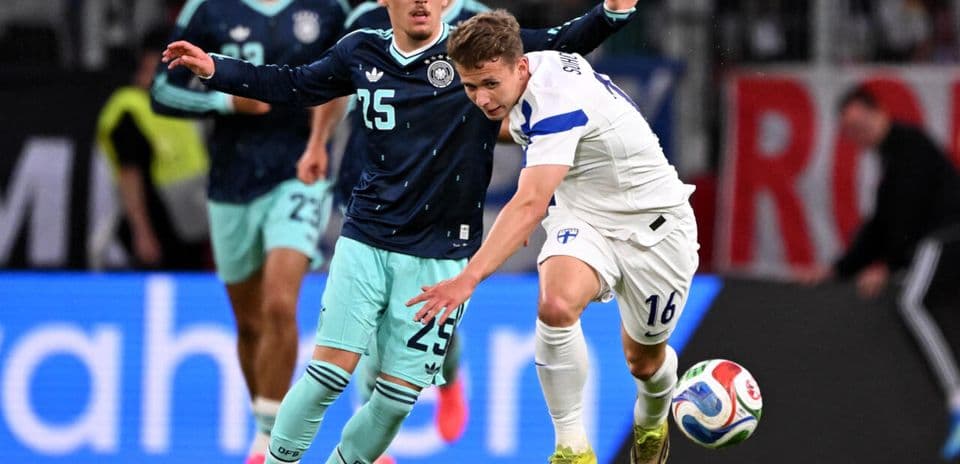 Player from Finland being challenged by German opponent
