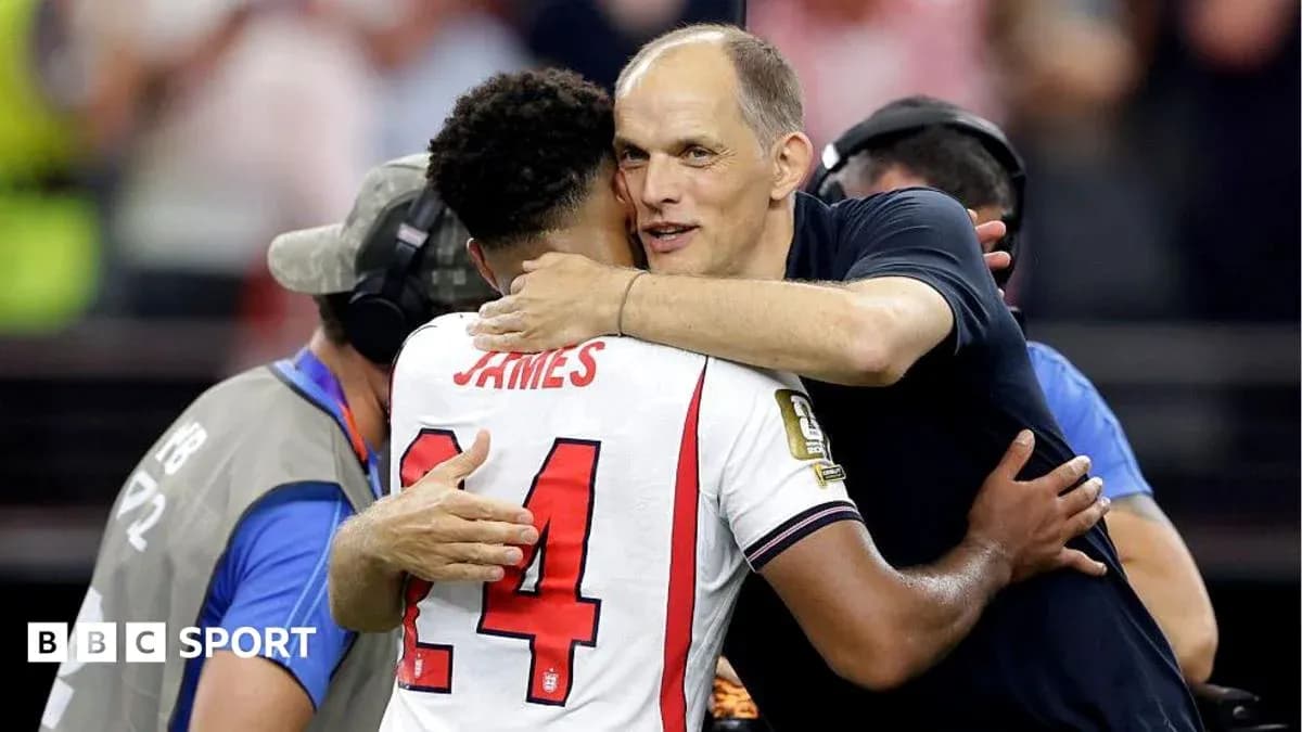 Player embracing coach after match celebration