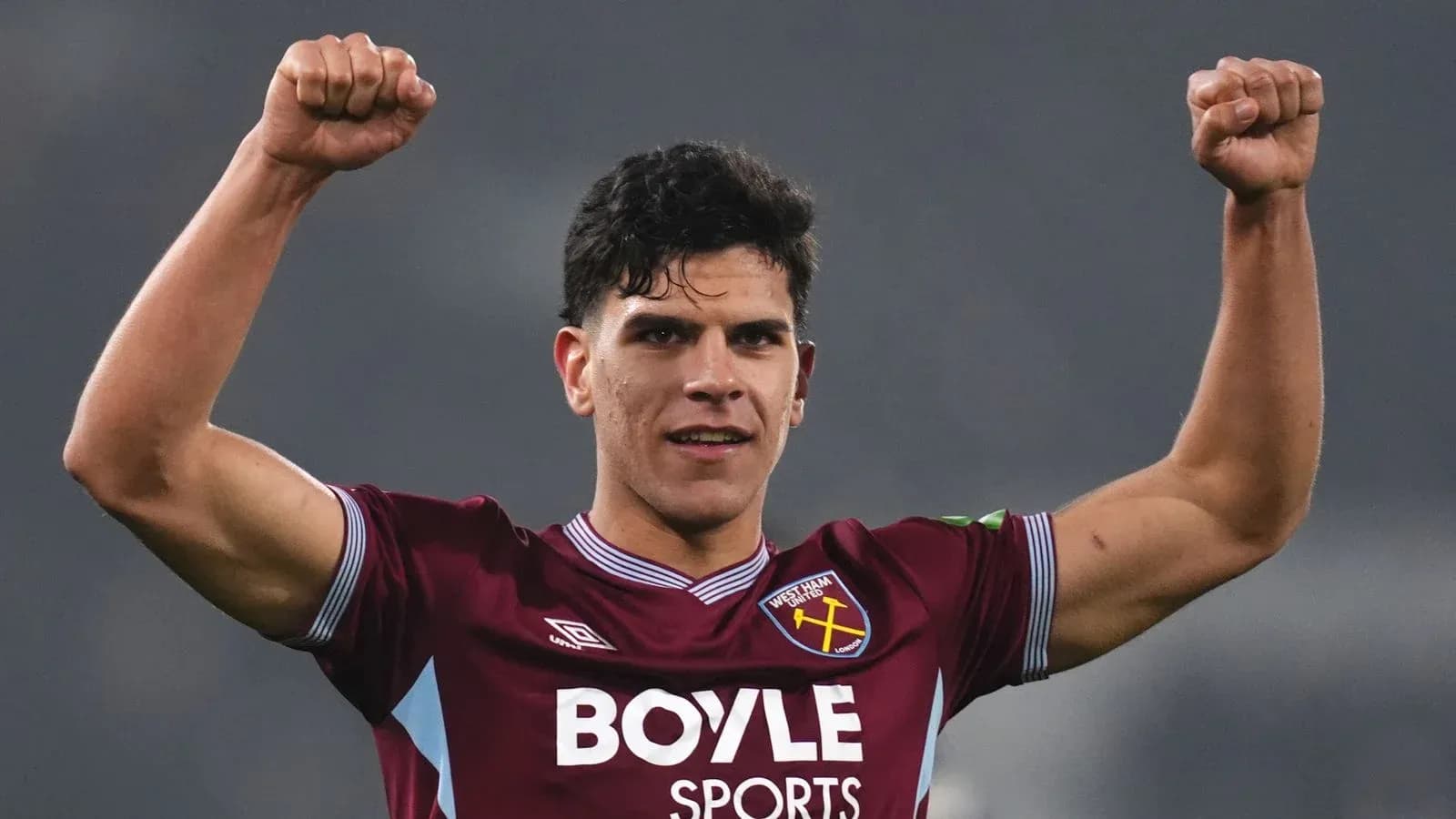 Player celebrating victory in West Ham United jersey