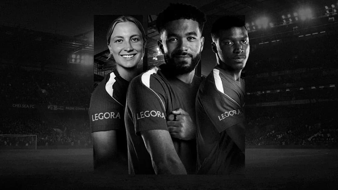 Three Chelsea FC players posing together in jerseys
