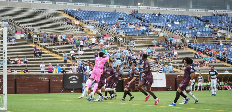 Goalkeeper making a save during match action