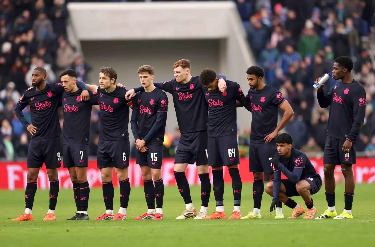 Everton players in a pre-match huddle