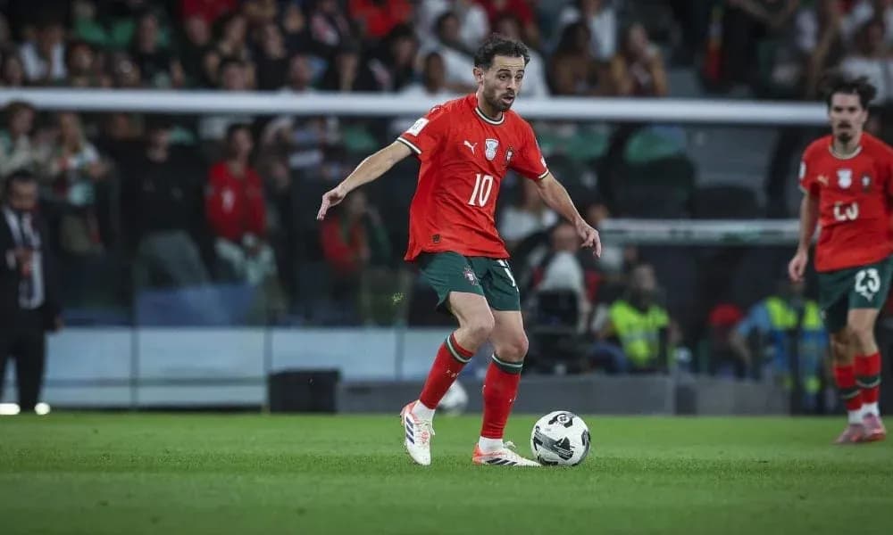 Player dribbling ball during football match