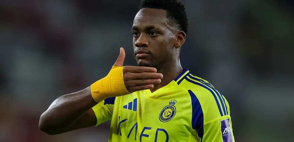 Player celebrating with hand gesture after match