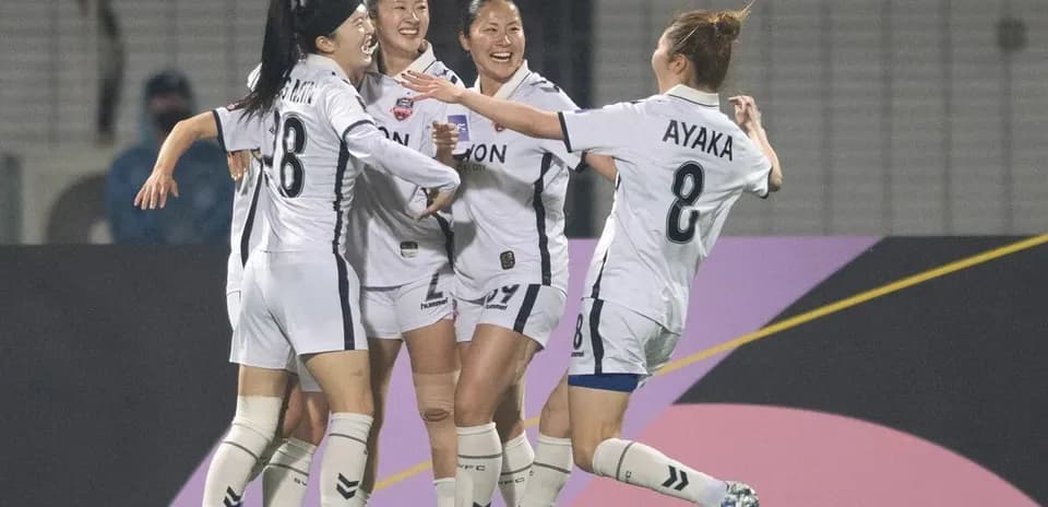 Suwon FMC W players celebrating a goal