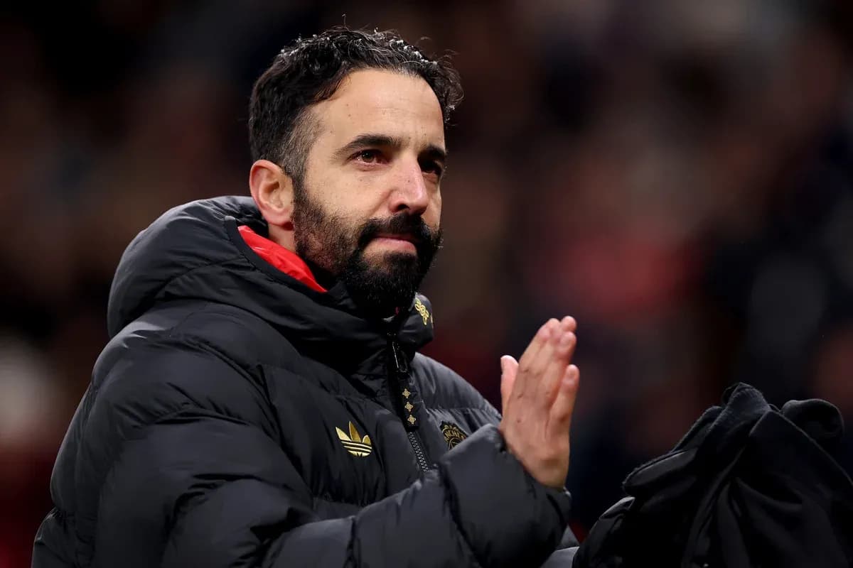 Coach applauding fans after the match