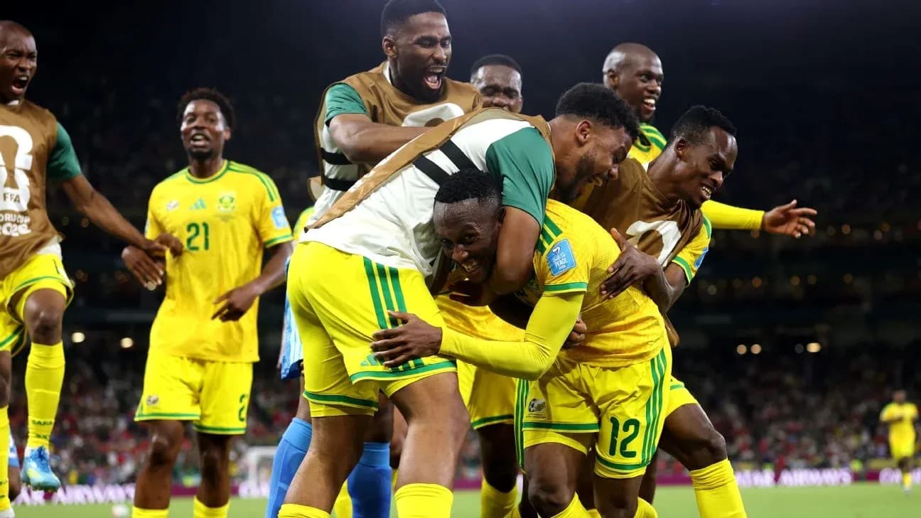 Players celebrating a goal during a match
