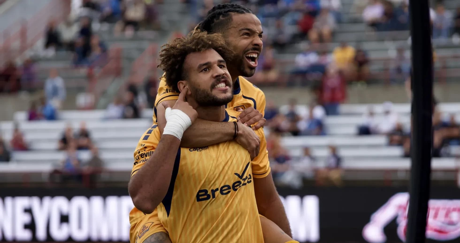 Players celebrating during Indy Eleven match