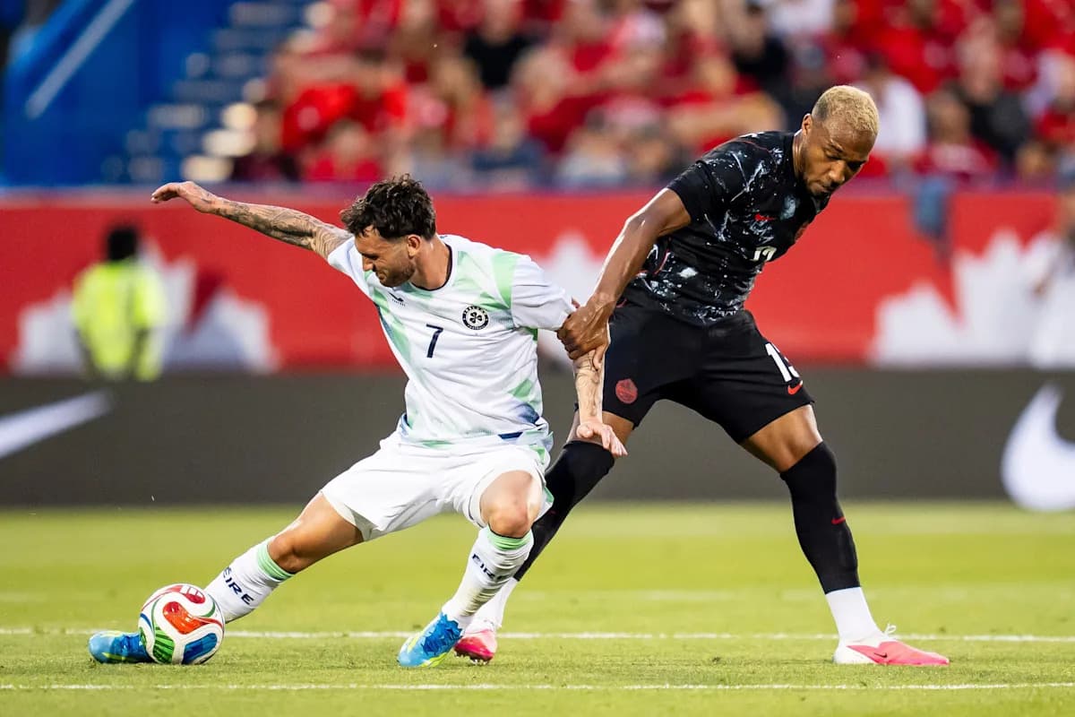Player attempting to tackle opponent during soccer match