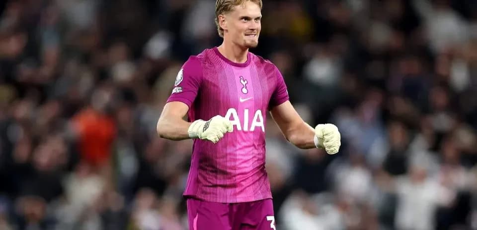 Goalkeeper celebrating in Tottenham kit after match