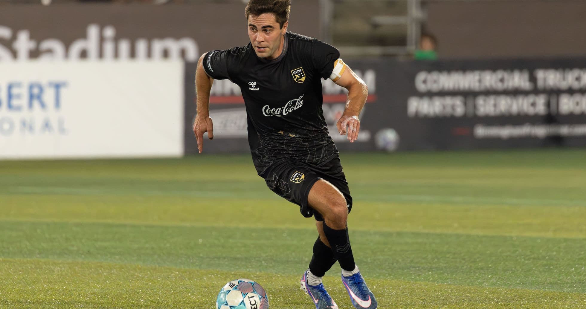 Player dribbling ball during Birmingham Legion match