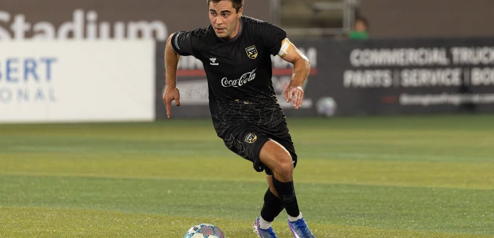 Player dribbling ball during Birmingham Legion match